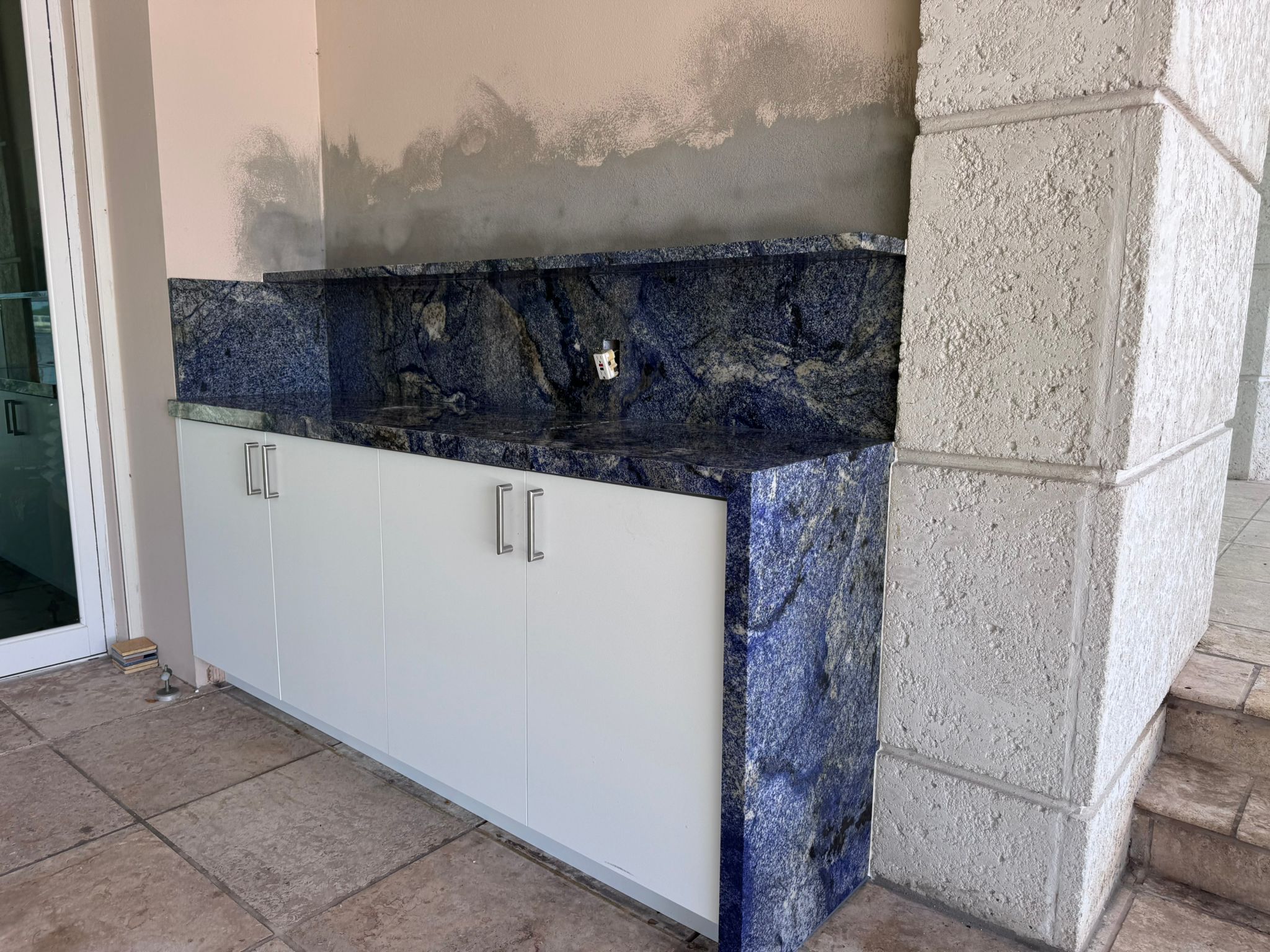 Luxury outdoor kitchen with exotic blue granite