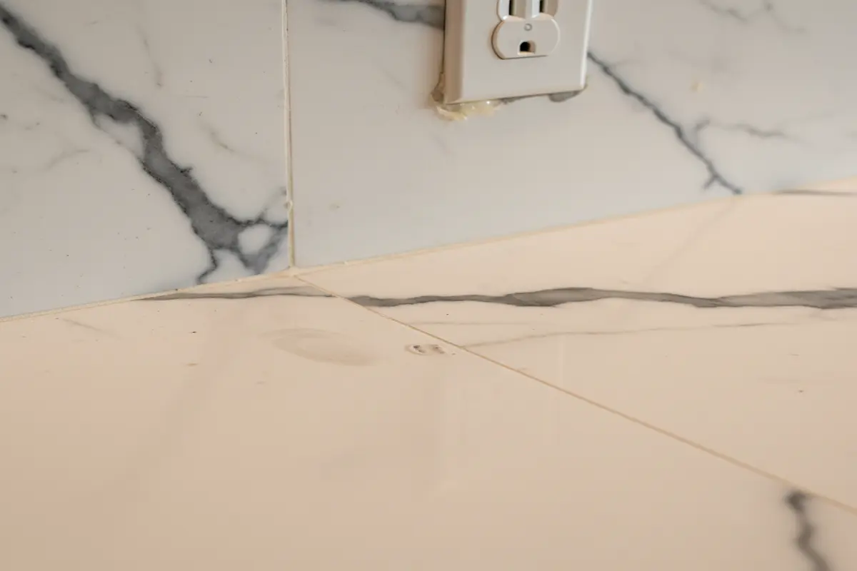Close-up of Statuario Marble corner joint.