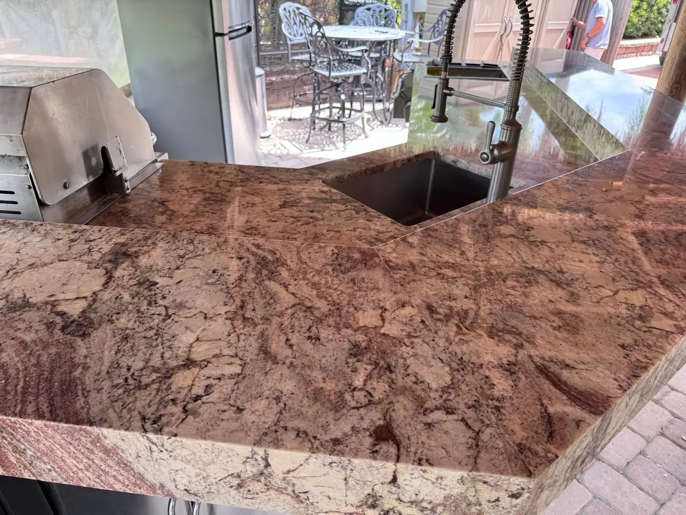 Brown granite outdoor kitchen countertop